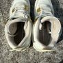 Air Jordan 4 White and Gold Trainers Image 6