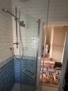 Glass shower screen and shower fittings