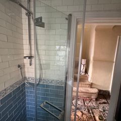 Glass shower screen and shower fittings