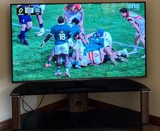 55 inch to  smart tv will h stand