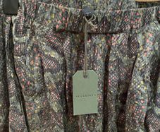 ALL SAINTS tags on khaki green snake print cuffed trousers