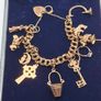 Vintage 9ct yellow gold charm bracelet Image 5