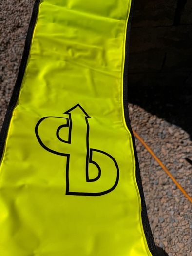 Surface marker buoy (SMB) with integrated cylinder