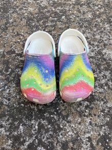 Rainbow crocs size four