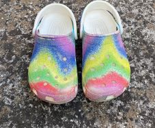 Rainbow crocs size four