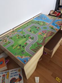 Wooden play table with storage