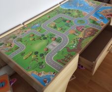 Wooden play table with storage