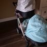 Twin pram and changing bag and 3 dolls Image 2