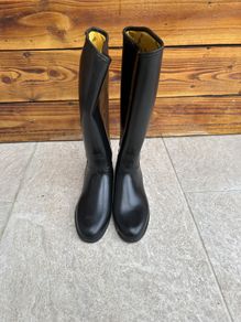 horse riding boots and body protector