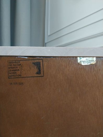 2 marbled top cabinets