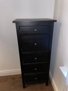 Black five-drawer chest of drawers