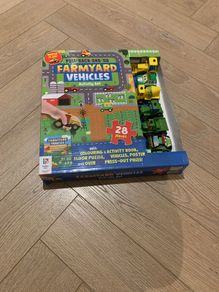 Farm yard vehicles and jigsaw.