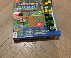 Farm yard vehicles and jigsaw.