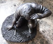 Adonis golfing figure