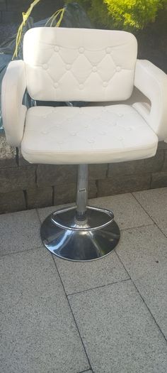 White faux leather chair