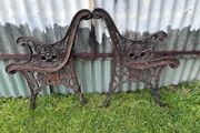 Pair of decorative cast iron bench ends