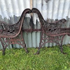 Pair of decorative cast iron bench ends