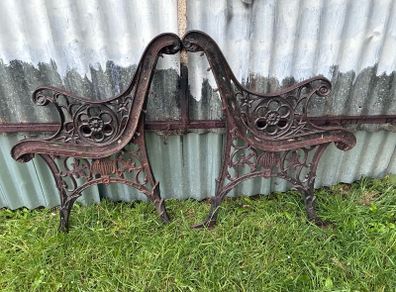 Pair of decorative cast iron bench ends