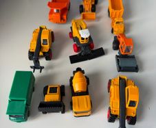Toy cars diggers, trucks, dumper trucks, cement mixer, road roller and more.