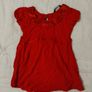 Oomph Blue Jeans And Red Top Image 2
