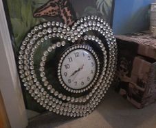 large black and crystal heart clock