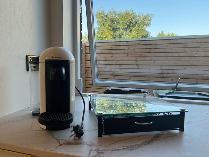 Nespresso Vertuo Plus Coffee Pod Machine with pod storage