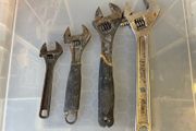 Adjustable wrenches