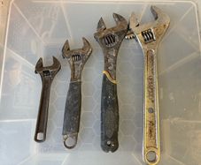 Adjustable wrenches