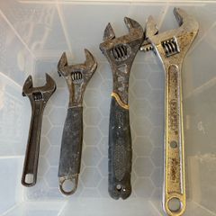 Adjustable wrenches
