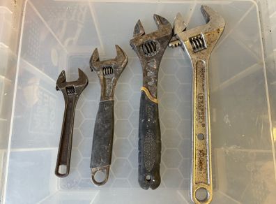 Adjustable wrenches