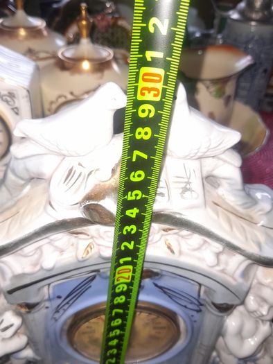 Porcelain Mantel Clock with Two Cherubs and Two Doves on top, and floral accents, Postage Available