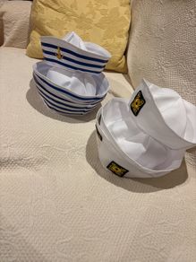Sailor dress up hats .