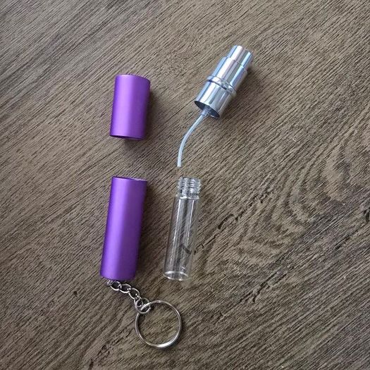 Perfume travel spray bottle keyhanger