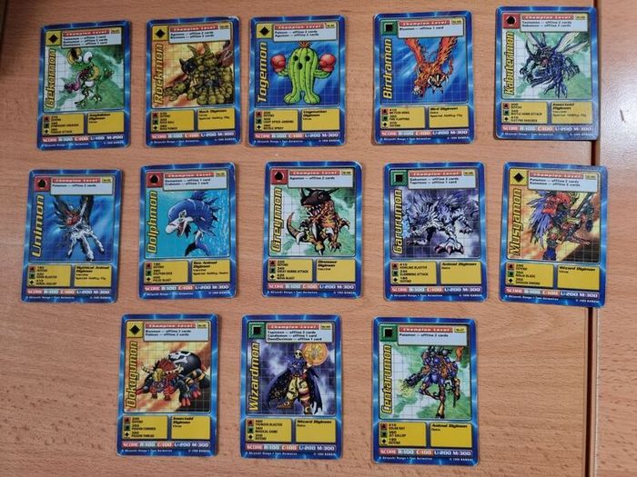 13 Champion level Digimon cards. 1999.