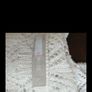 A. Wear white 100% cotton wrap over cardigan. Image 5