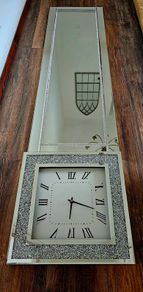 large mirror with clock