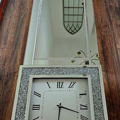 large mirror with clock