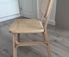 Four Voxlov IKEA light bamboo dining chairs