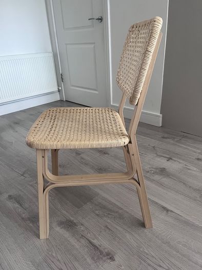 Four Voxlov IKEA light bamboo dining chairs