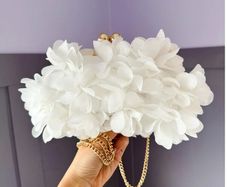 The Rosie and Dott Fleur Clutch bag (gold)