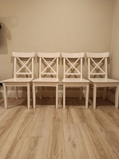 For sale: a set of 4 classic IKEA dining chairs, model INGOLF in white.!