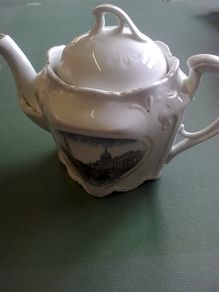 Old souvenir teapot with scene of Custom House Dublin.