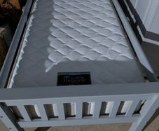 Grey single bed with sides and new mattress