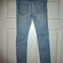 Bundle of 5 pairs of skinny jeans, excellent condition, size 8-9 yo Image 3