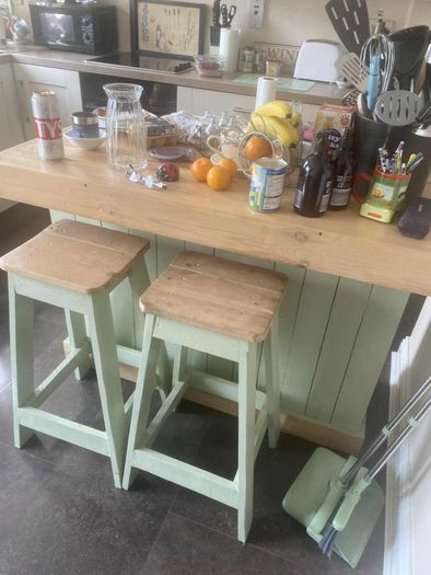 Rustic kitchen island with triple overhang