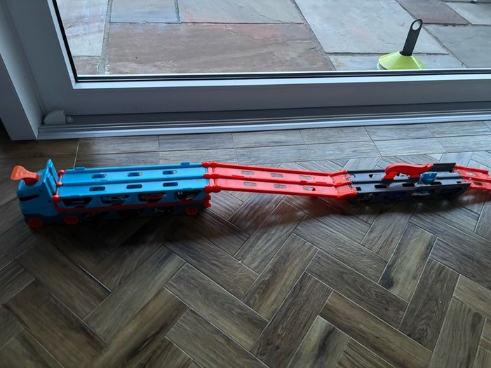 Hot wheels transporter and 22 cars