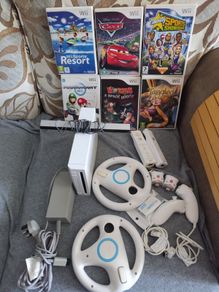 Nintendo Wii with Mario kart and Sports Resort