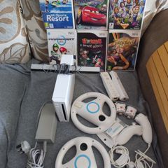 Nintendo Wii with Mario kart and Sports Resort