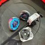 Beyblade stand with 2 beyblades Image 2