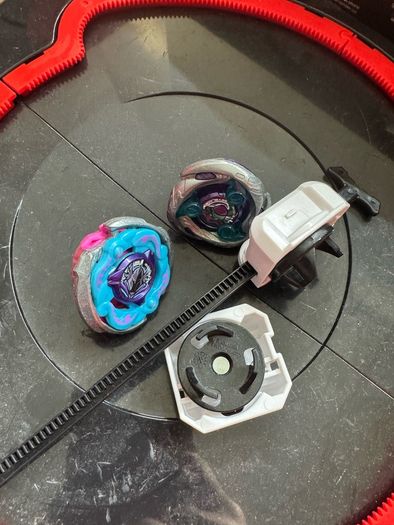 Beyblade stand with 2 beyblades